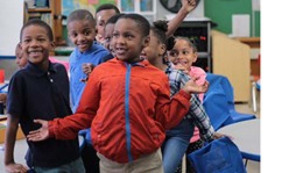 a group of children in a classroom